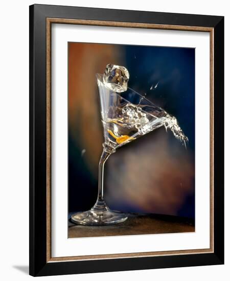 Vodka Martini Spilling from a Bent Martini Glass with Ice Cube-Jeff Sarpa-Framed Photographic Print