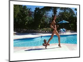 Vogue - April 1999 - Poolside Strut-Arthur Elgort-Mounted Premium Photographic Print