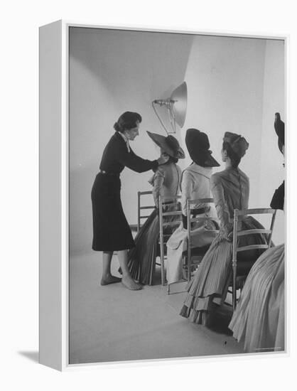 Vogue Magazine Editor Bettina Ballard Directing and prepping models for Photo Shoot at Studio-Nat Farbman-Framed Premier Image Canvas