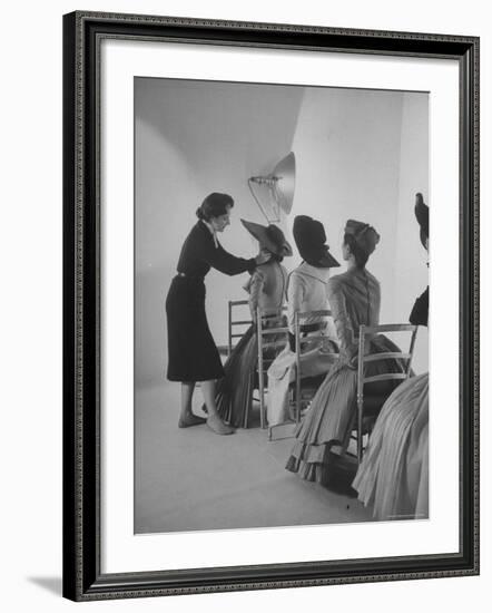 Vogue Magazine Editor Bettina Ballard Directing and prepping models for Photo Shoot at Studio-Nat Farbman-Framed Premium Photographic Print