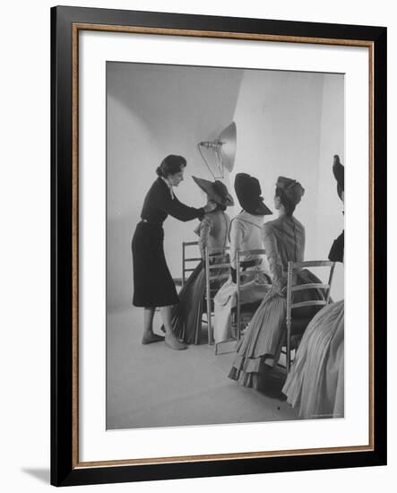 Vogue Magazine Editor Bettina Ballard Directing and prepping models for Photo Shoot at Studio-Nat Farbman-Framed Premium Photographic Print