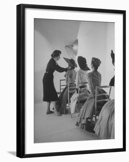 Vogue Magazine Editor Bettina Ballard Directing and prepping models for Photo Shoot at Studio-Nat Farbman-Framed Premium Photographic Print