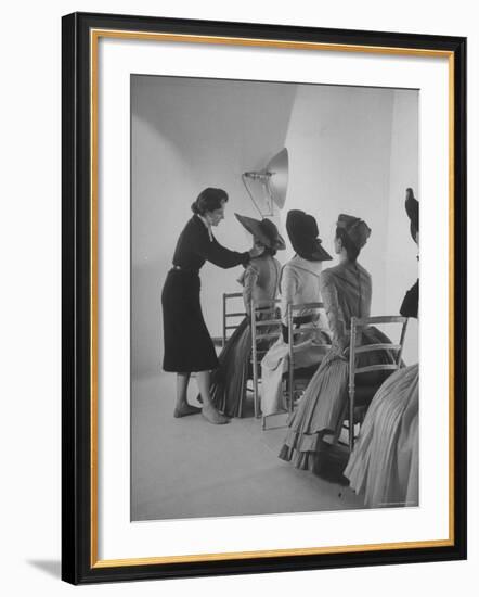 Vogue Magazine Editor Bettina Ballard Directing and prepping models for Photo Shoot at Studio-Nat Farbman-Framed Premium Photographic Print