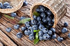 Blueberries Have Dropped from the Basket on an Old Wooden Table.-Volff-Photographic Print