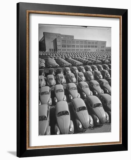 Volkswagen Factory Rolls an Average of 150 Efficient 4 Cylinder Sedans Into Storage Yards Every Day-Walter Sanders-Framed Photographic Print