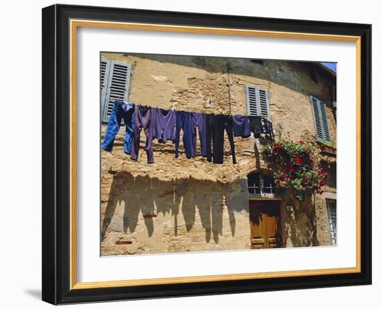 Volterra, Tuscany, Italy. Washing Hanging on a Line-Fraser Hall-Framed Photographic Print