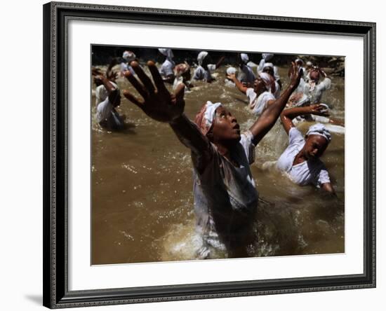 Voodoo Believers Perform a Ceremony at a Sacred Pool in Souvenance, Haiti-null-Framed Photographic Print