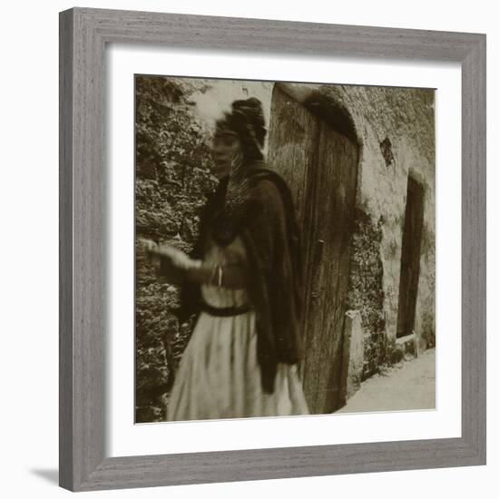 Voyage en Algérie : Femme marchant dans une rue à Biskra-Henri Jacques Edouard Evenepoel-Framed Giclee Print