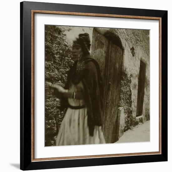 Voyage en Algérie : Femme marchant dans une rue à Biskra-Henri Jacques Edouard Evenepoel-Framed Giclee Print