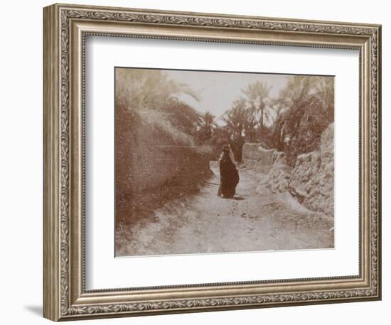 Voyage en Algérie : Femme voilée dans une rue de Sidi-Okba-Henri Jacques Edouard Evenepoel-Framed Giclee Print