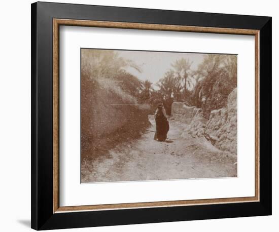 Voyage en Algérie : Femme voilée dans une rue de Sidi-Okba-Henri Jacques Edouard Evenepoel-Framed Giclee Print