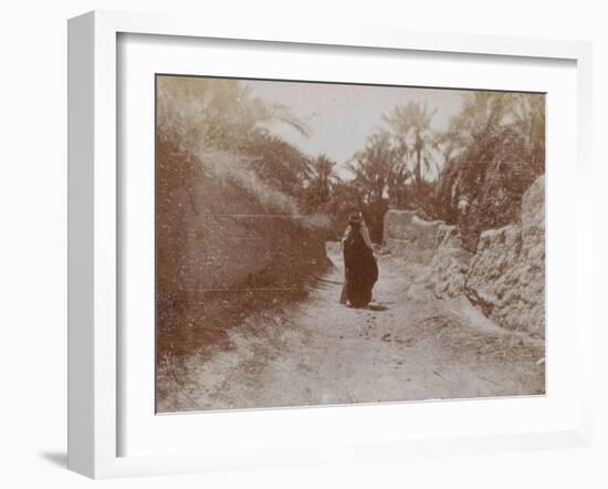 Voyage en Algérie : Femme voilée dans une rue de Sidi-Okba-Henri Jacques Edouard Evenepoel-Framed Giclee Print