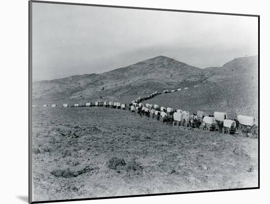 Wagon Train - Oregon Trail Wagon Train Reenactment, 1935-Ashael Curtis-Mounted Giclee Print