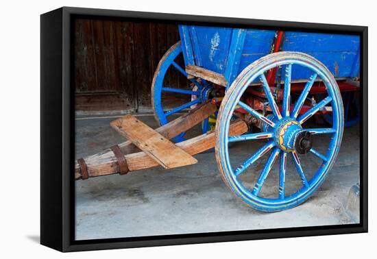 Wagon Wheel . Close-Up of an Antique Wagon Wheel Located in A Fortress.-maggee-Framed Premier Image Canvas