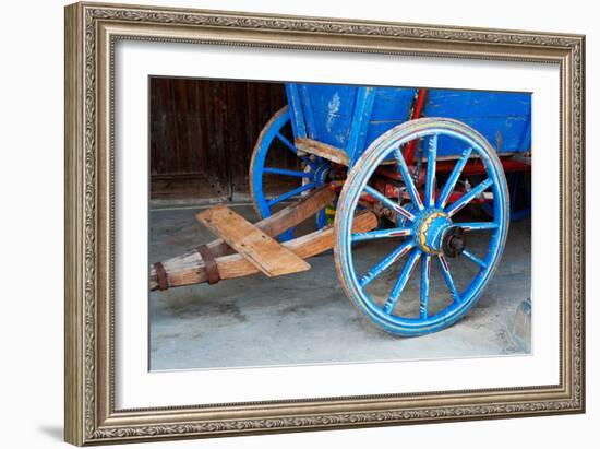 Wagon Wheel . Close-Up of an Antique Wagon Wheel Located in A Fortress.-maggee-Framed Photographic Print