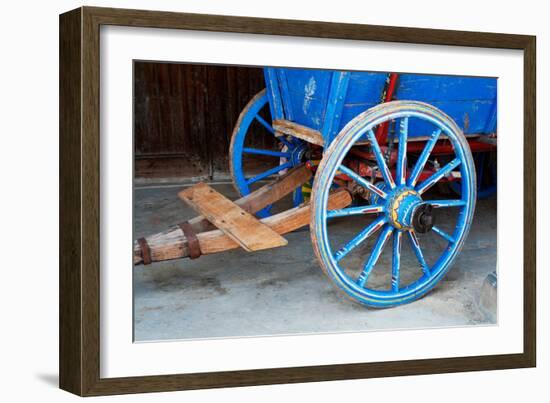 Wagon Wheel . Close-Up of an Antique Wagon Wheel Located in A Fortress.-maggee-Framed Photographic Print