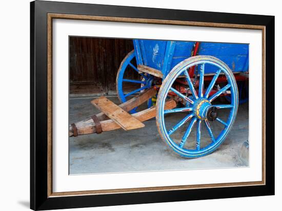 Wagon Wheel . Close-Up of an Antique Wagon Wheel Located in A Fortress.-maggee-Framed Photographic Print