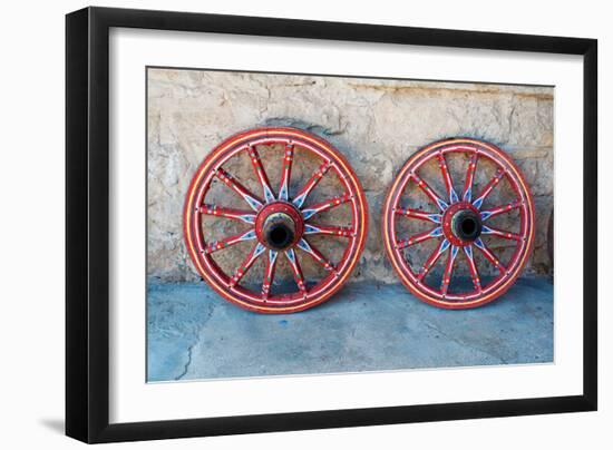 Wagon Wheel . Close-Up of an Antique Wagon Wheel Located in A Fortress.-maggee-Framed Photographic Print