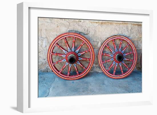 Wagon Wheel . Close-Up of an Antique Wagon Wheel Located in A Fortress.-maggee-Framed Photographic Print