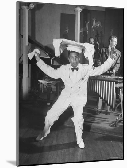 Waiter Dancing with a Tray on His Head-Wallace Kirkland-Mounted Photographic Print