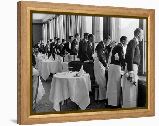 Waiters in the Grand Hotel Dining Room Lined Up at Window Watching Sonia Henie Ice Skating Outside-Alfred Eisenstaedt-Framed Premier Image Canvas