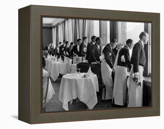 Waiters in the Grand Hotel Dining Room Lined Up at Window Watching Sonia Henie Ice Skating Outside-Alfred Eisenstaedt-Framed Premier Image Canvas