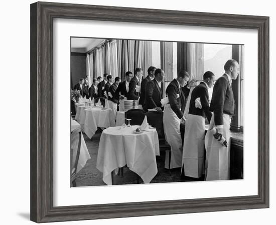 Waiters in the Grand Hotel Dining Room Lined Up at Window Watching Sonia Henie Ice Skating Outside-Alfred Eisenstaedt-Framed Photographic Print