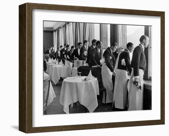 Waiters in the Grand Hotel Dining Room Lined Up at Window Watching Sonia Henie Ice Skating Outside-Alfred Eisenstaedt-Framed Photographic Print