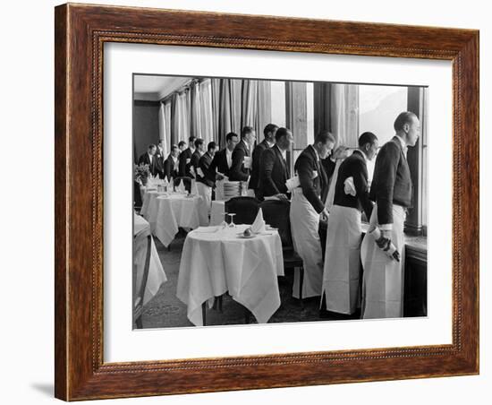 Waiters in the Grand Hotel Dining Room Lined Up at Window Watching Sonia Henie Ice Skating Outside-Alfred Eisenstaedt-Framed Photographic Print