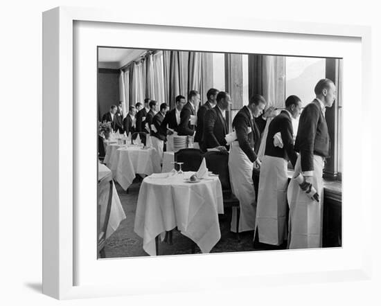 Waiters in the Grand Hotel Dining Room Lined Up at Window Watching Sonia Henie Ice Skating Outside-Alfred Eisenstaedt-Framed Photographic Print