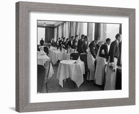 Waiters in the Grand Hotel Dining Room Lined Up at Window Watching Sonja Henie Ice Skating Outside-Alfred Eisenstaedt-Framed Photographic Print