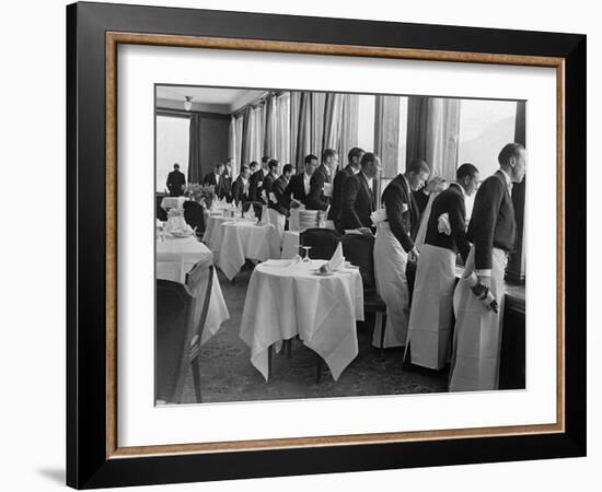 Waiters in the Grand Hotel Dining Room Lined Up at Window Watching Sonja Henie Ice Skating Outside-Alfred Eisenstaedt-Framed Photographic Print