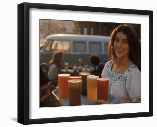 Waitress Carrying Tray of Carrot, Celery. Beet, Orange, Apple, and Grapefruit Juice at "The Source"-Michael Rougier-Framed Photographic Print