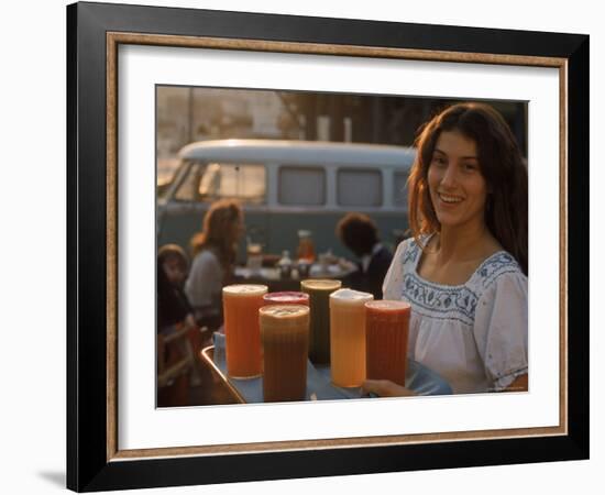 Waitress Carrying Tray of Carrot, Celery. Beet, Orange, Apple, and Grapefruit Juice at "The Source"-Michael Rougier-Framed Photographic Print