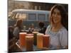 Waitress Carrying Tray of Carrot, Celery. Beet, Orange, Apple, and Grapefruit Juice at "The Source"-Michael Rougier-Mounted Photographic Print