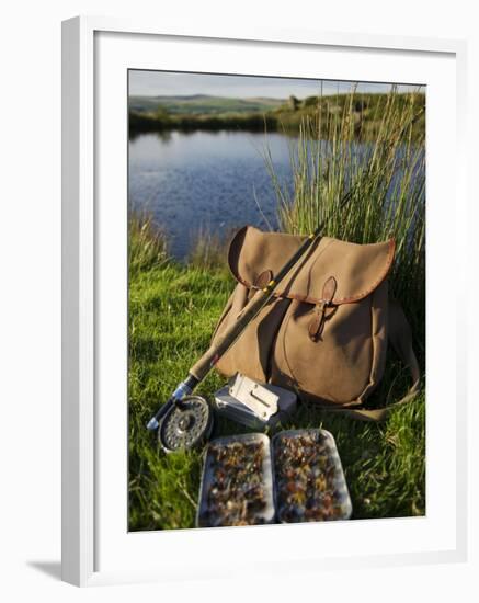 Wales, Conwy, A Trout Rod and Fly Fishing Equipment Beside a Hill Lake in North Wales, UK-John Warburton-lee-Framed Photographic Print