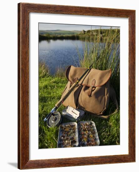 Wales, Conwy, A Trout Rod and Fly Fishing Equipment Beside a Hill Lake in North Wales, UK-John Warburton-lee-Framed Photographic Print