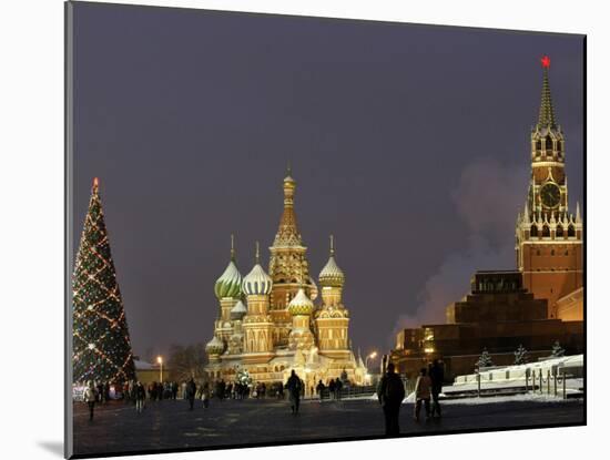 Walking Past a Huge Christmas Tree in Red Square in Moscow-null-Mounted Photographic Print