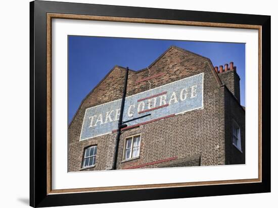 Wall Mural Inscribed with 'Take Courage' Slogan on an End of Terrace Brick House Built around 1807-Julian Castle-Framed Photo