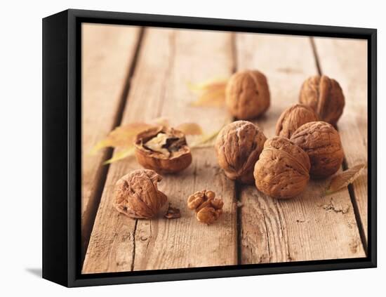 Walnuts on a Wooden Background-Matthias Hoffmann-Framed Premier Image Canvas