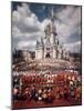 Walt Disney Characters and Park Staff Posing En Masse in Front of Cinderella's Castle-Yale Joel-Mounted Photographic Print