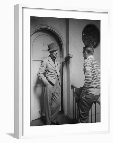 Walt Disney Chatting with Unidentified Man in Hallway Outside of His Office-Alfred Eisenstaedt-Framed Premium Photographic Print