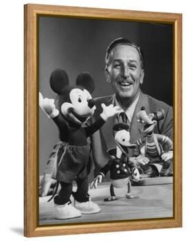 Walt Disney, of Walt Disney Studios, Posing with Some Famous Cartoon Characters-J. R. Eyerman-Framed Premier Image Canvas