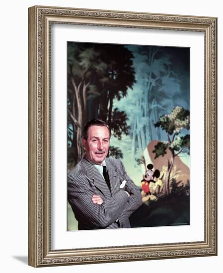 Walt Disney Posing Against Landscape Backdrop Containing Mickey Mouse-Alfred Eisenstaedt-Framed Premium Photographic Print