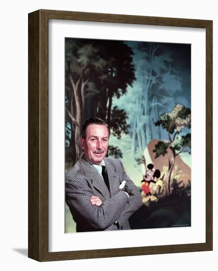 Walt Disney Posing Against Landscape Backdrop Containing Mickey Mouse-Alfred Eisenstaedt-Framed Premium Photographic Print