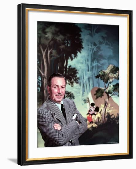 Walt Disney Posing Against Landscape Backdrop Containing Mickey Mouse-Alfred Eisenstaedt-Framed Premium Photographic Print