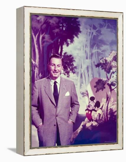 Walt Disney Posing Against Landscape Backdrop Containing Mickey Mouse-Alfred Eisenstaedt-Framed Premier Image Canvas