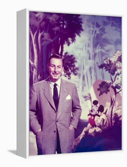 Walt Disney Posing Against Landscape Backdrop Containing Mickey Mouse-Alfred Eisenstaedt-Framed Premier Image Canvas