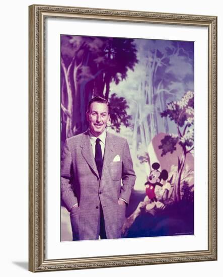 Walt Disney Posing Against Landscape Backdrop Containing Mickey Mouse-Alfred Eisenstaedt-Framed Premium Photographic Print