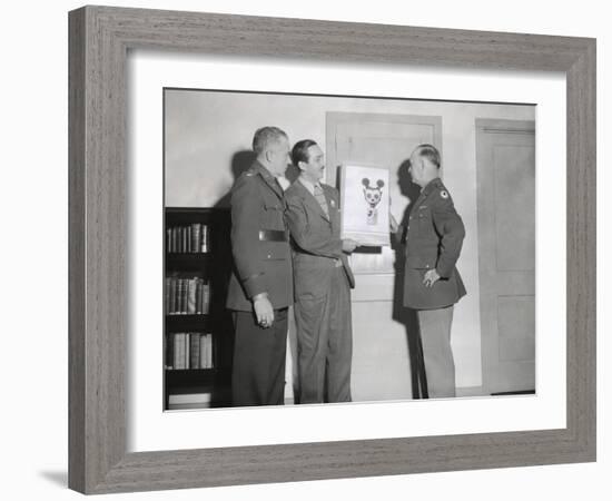 Walt Disney Showing a Sketch of Mickey Mouse Gas Mask to Chemical Warfare Officer-null-Framed Photo